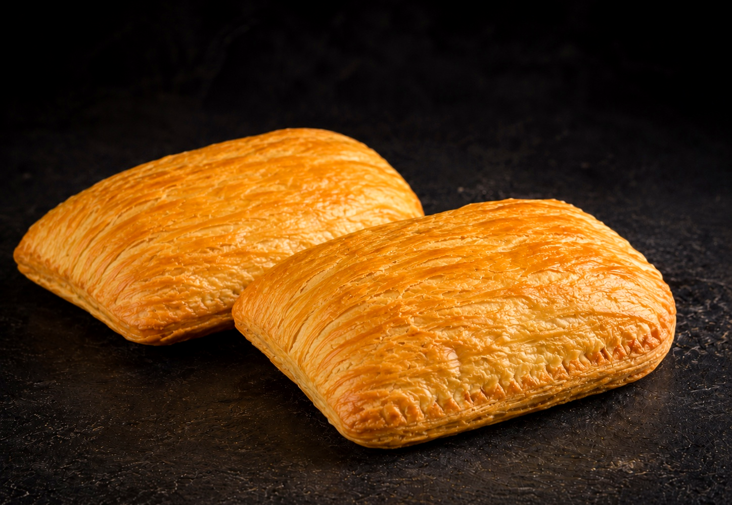 Golden, flaky Jamaican patties fresh from the Jam Jam machine